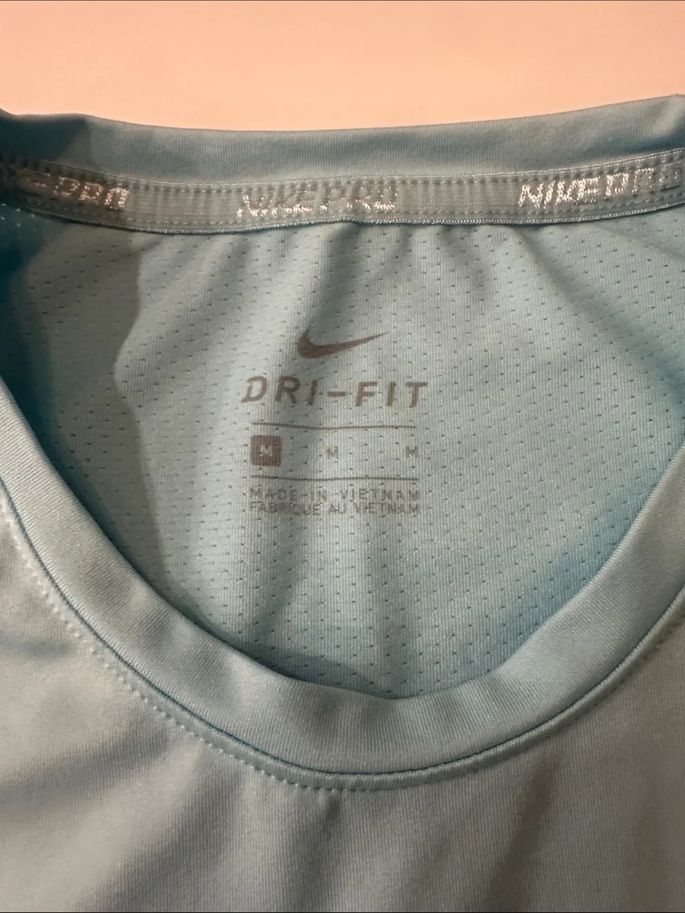 Nike Pale Blue Short Sleeve Performance Tee with Black SwooshGirls medium